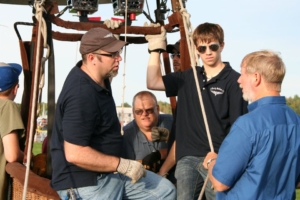 Carroll gives flight instruction to son Lance and grandson Jake