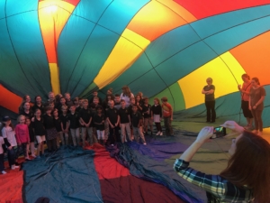 inside colorful balloon taking photo