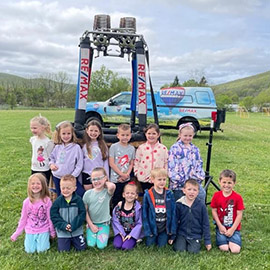 elementary kids around basket 270×270